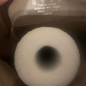 Cute suede-like boots with lace up detail in back